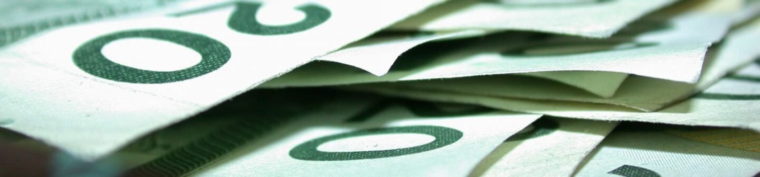 Close-up of stacked dollar bills