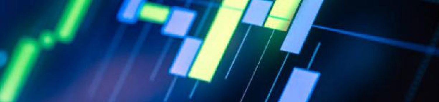 Close-up of a digital financial chart with candlestick patterns.