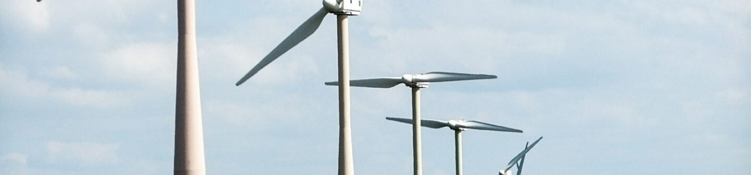 Changing profile of sustainable fixed income funds 3-9-2019 Row of wind turbines along rural road