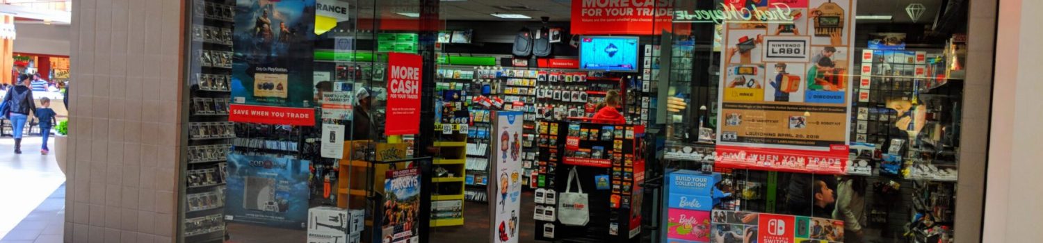 GameStop storefront with neon sign