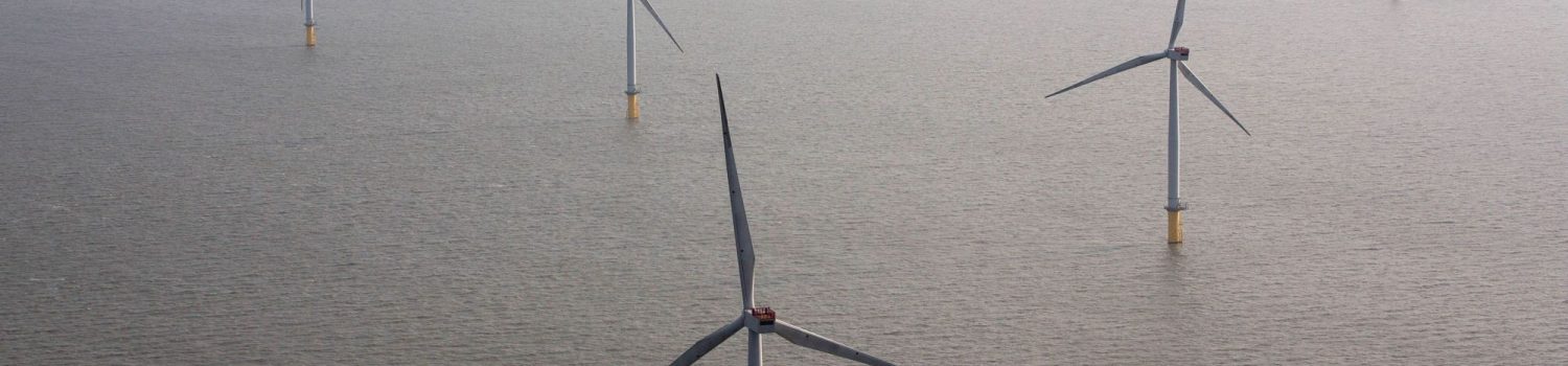 Wind turbines sit in the North Sea at the London Array offshore wind farm, a partnership between Dong Energy A/S, E.ON AG and Abu Dhabi-based Masdar, in the Thames Estuary, U.K., on Tuesday, Oct. 27, 2015. The London Array, east of London, has 175 Siemens turbines and a capacity of 630MW. Photographer: Simon Dawson/Bloomberg