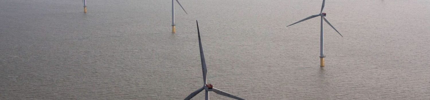 Aerial Views Of The London Array Offshore Windfarm Offshore wind turbines in misty sea