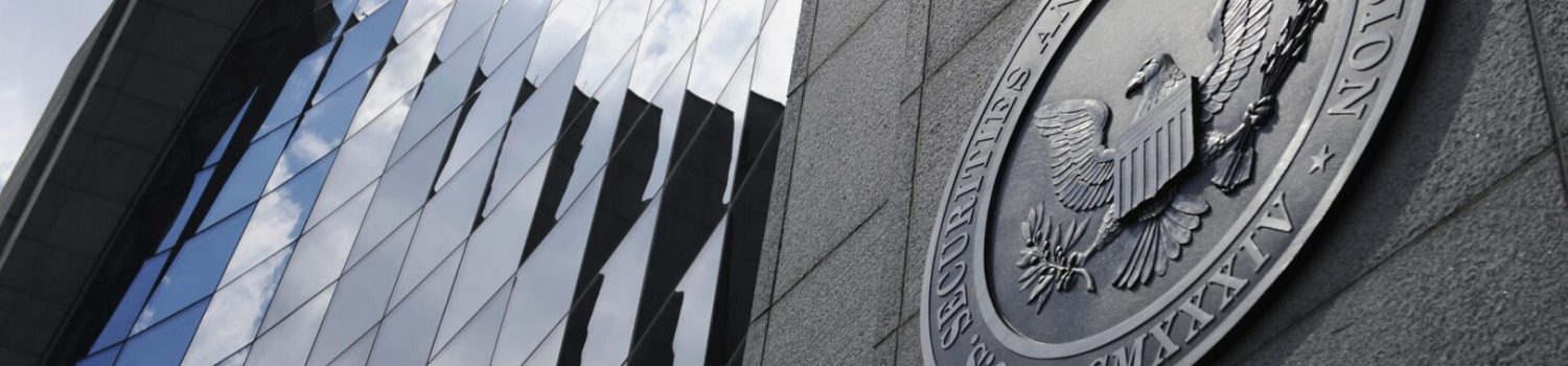 SEC seal on modern glass building