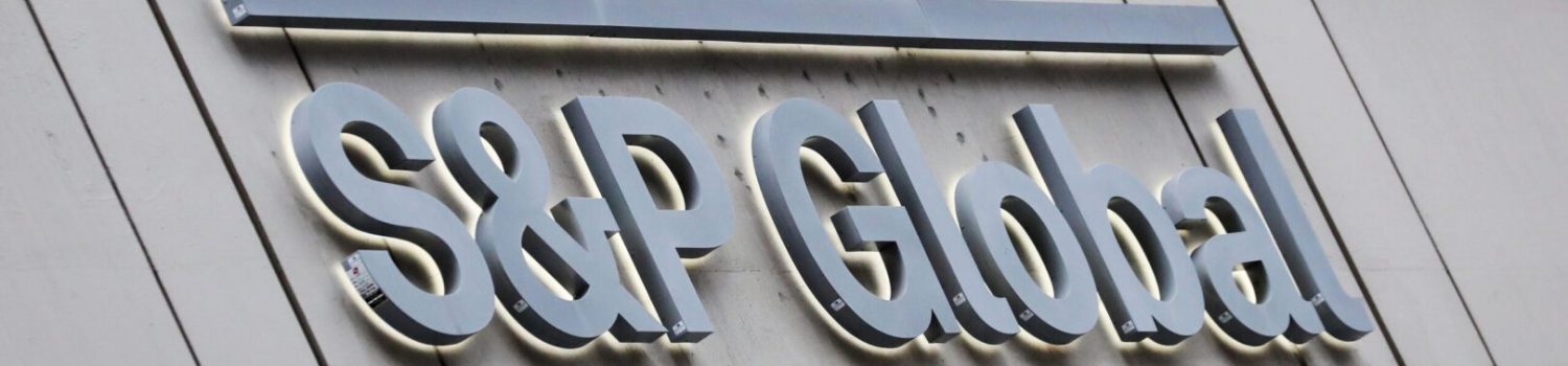 FILE PHOTO: The S&P Global logo is displayed on its offices in the financial district in New York Illuminated S&P Global sign on building