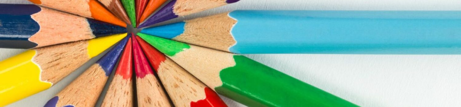 Circle of sharpened colored pencils